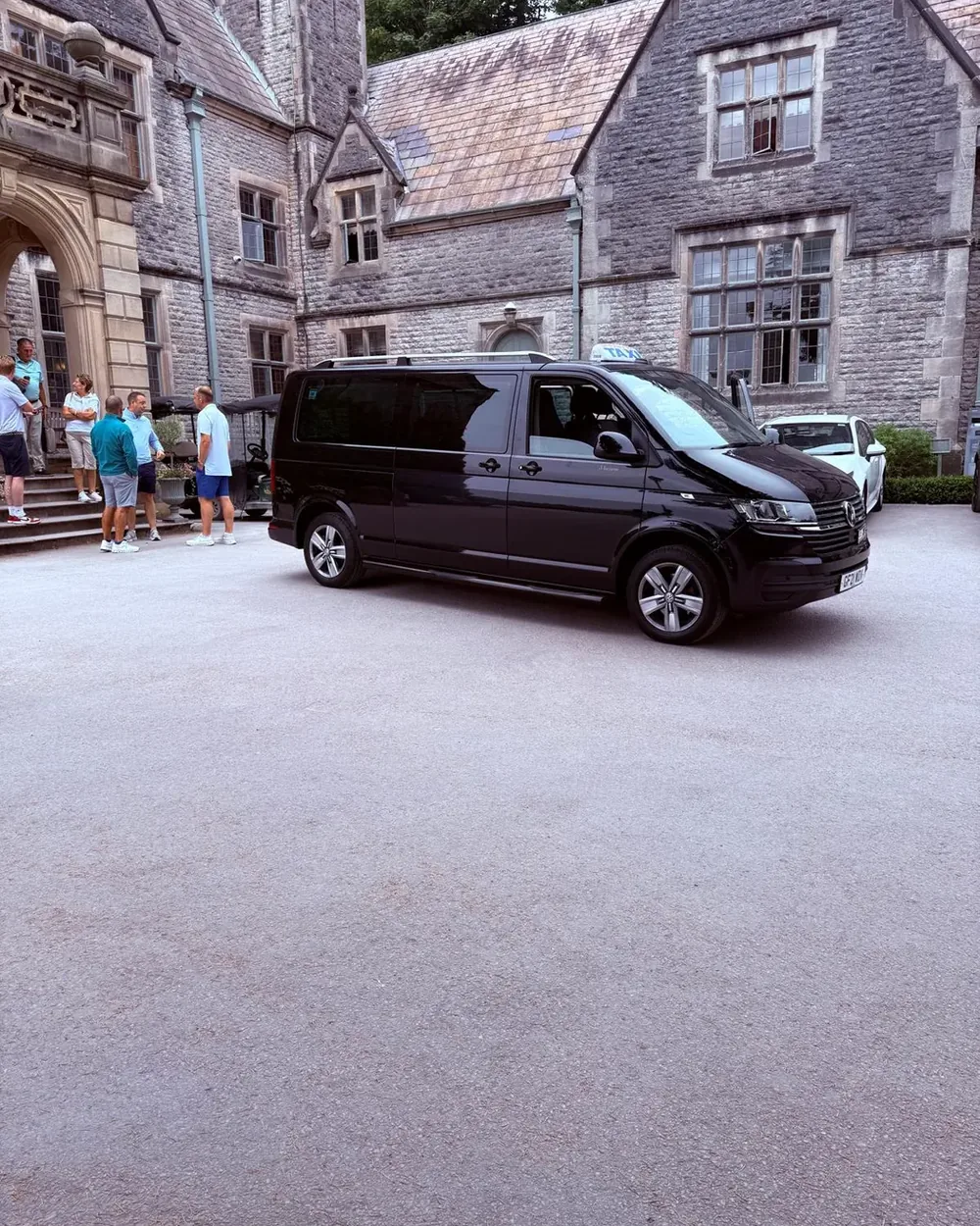Executive minibus at a country manor